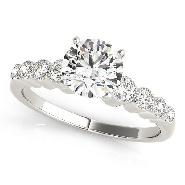 ENGAGEMENT RINGS SINGLE ROW BEZEL SET