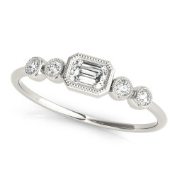5 STONE FASHION RING EMERALD CUT CENTER